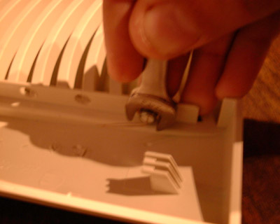 LED holders installed with a wrench for scale