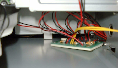 Module mounted behind the hard drive cage
