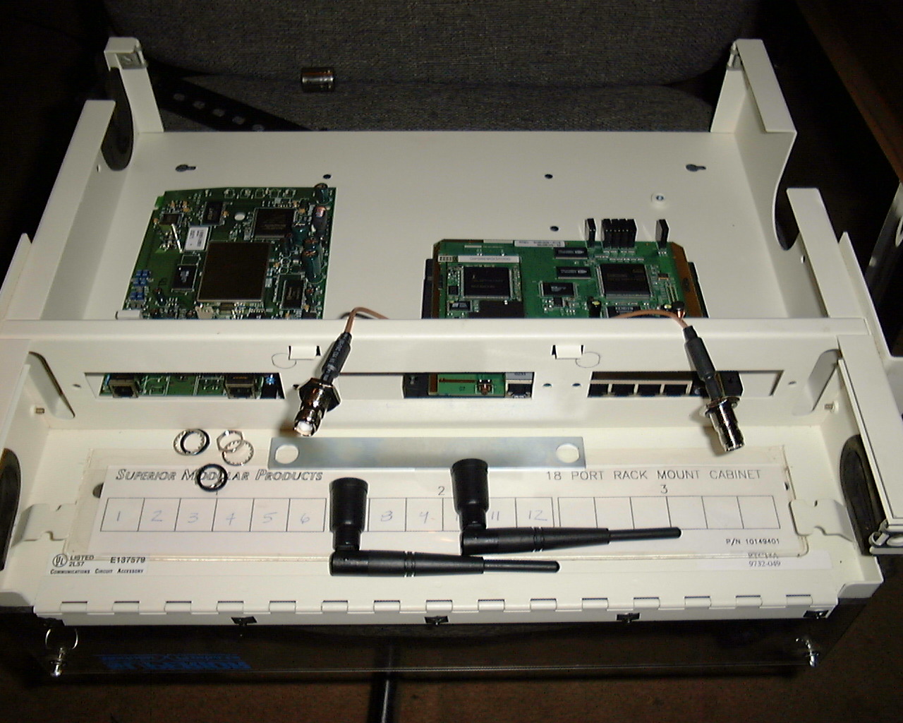 The empty rack-mount fiber patch panel before modification