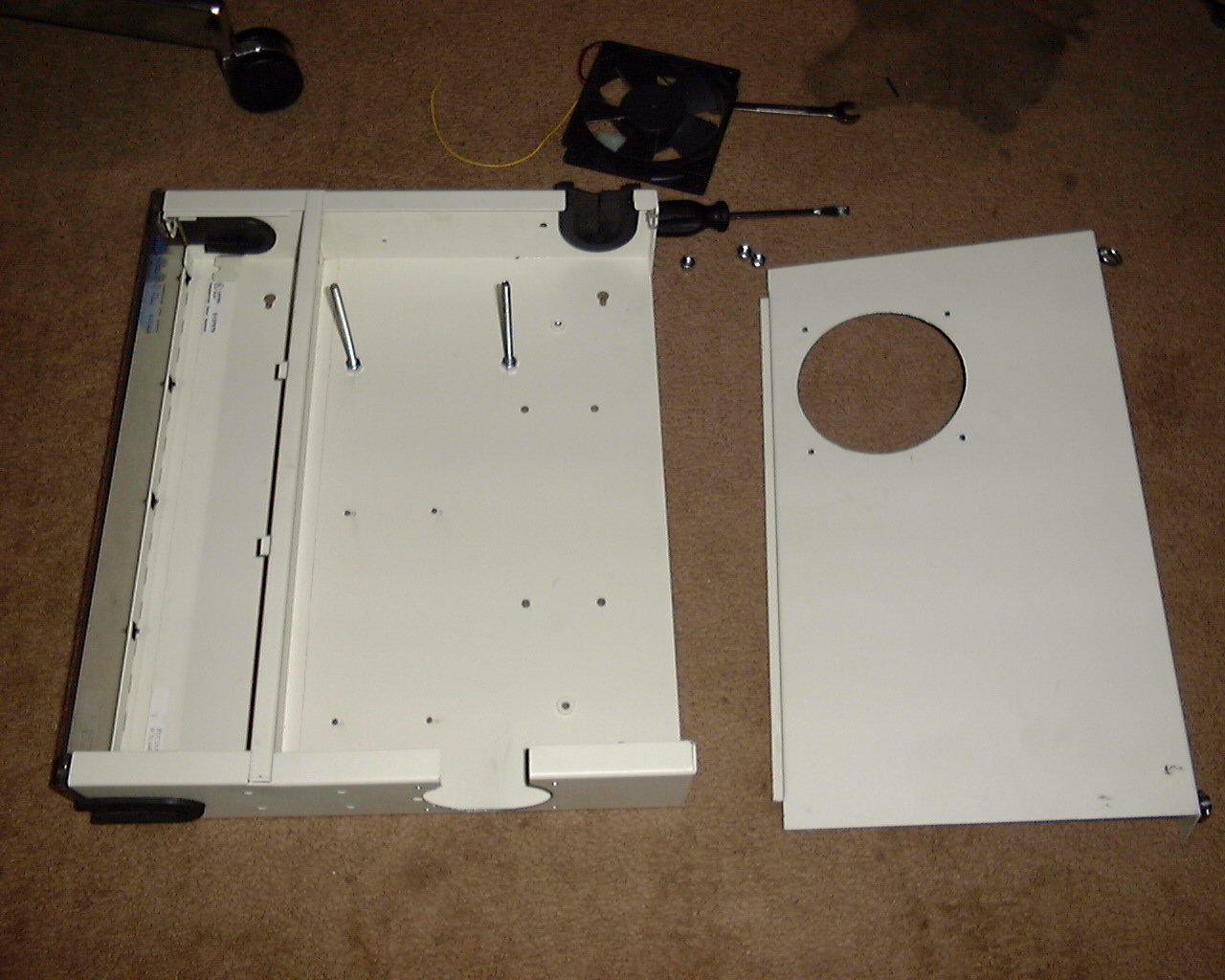 Interior of the panel showing mounting bolts attached to the bottom